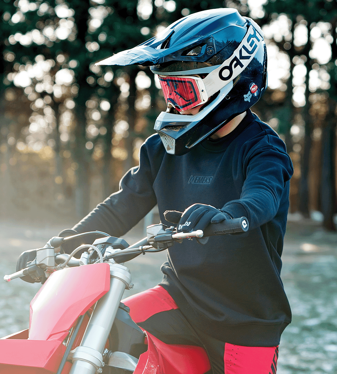Motocross rider wearing Moto sweatshirt in cold weather UK conditions EMEKS