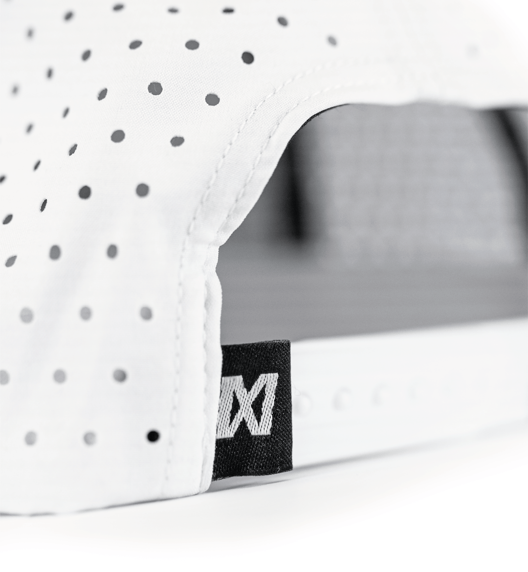 White snapback hat with motocross MX branding EMEKS UK